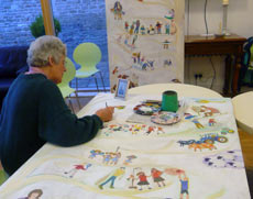 Jean Gill painting her husband